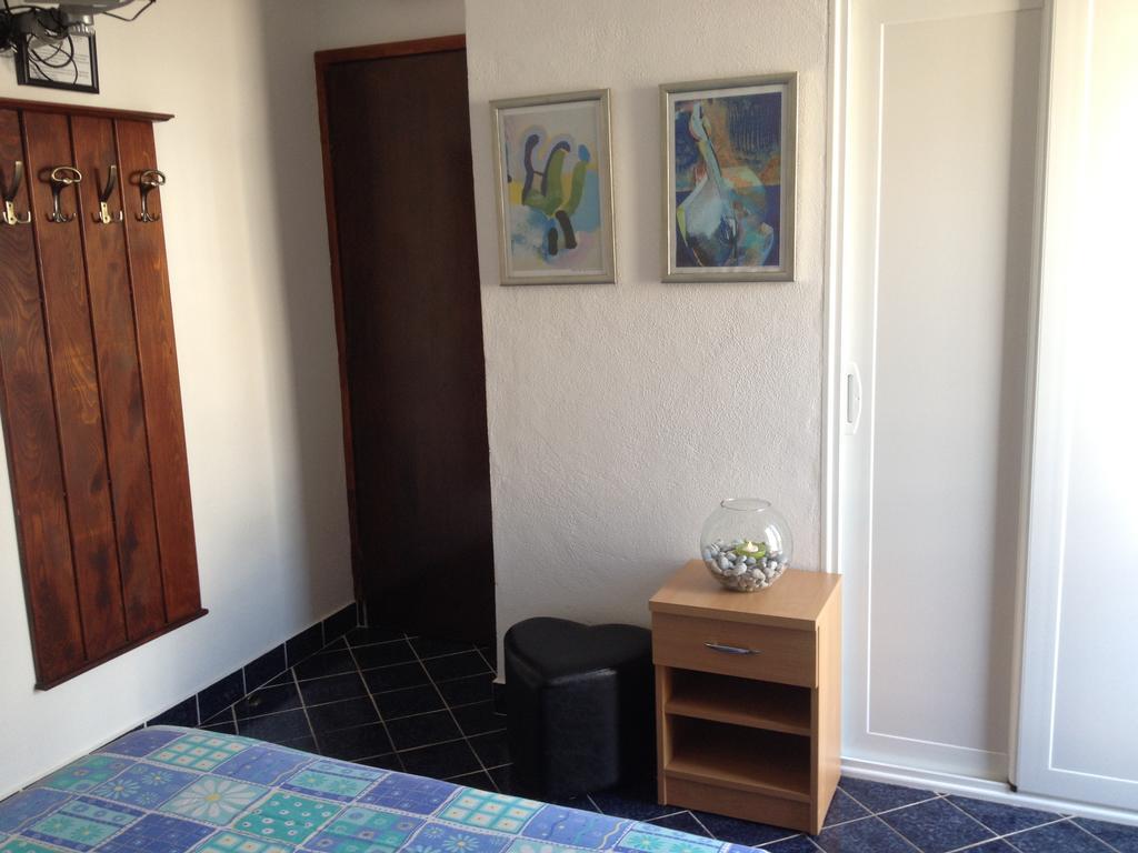 Apartments Holiday Budva Pokoj fotografie